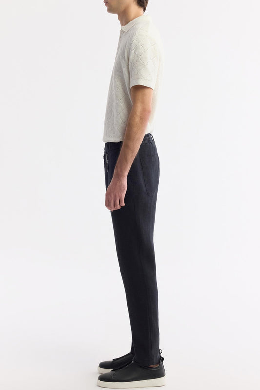 Side profile of Black Linen Pants with relaxed taper cut