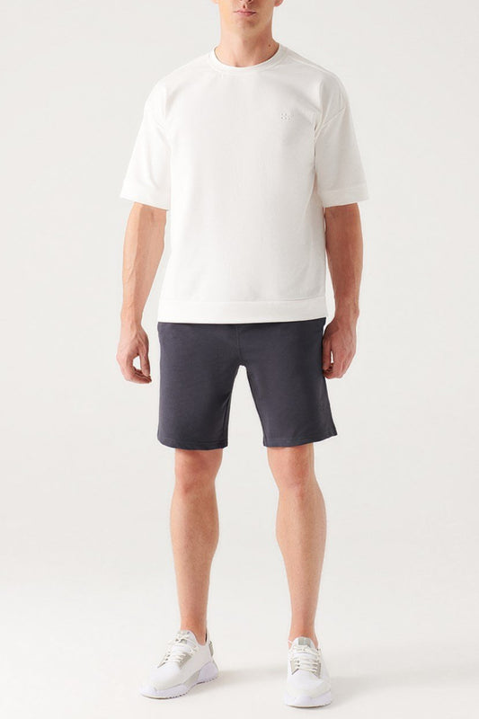 Men wearing anthracite cotton shorts with white oversized t-shirt front view – Swiftyle
