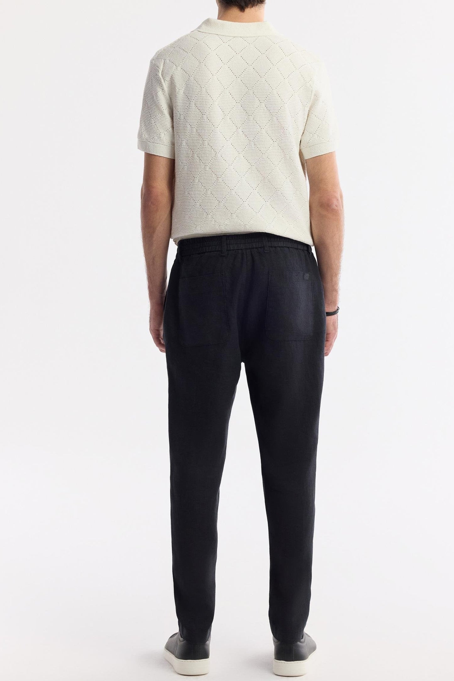 Back view showing patch pockets and waist fit