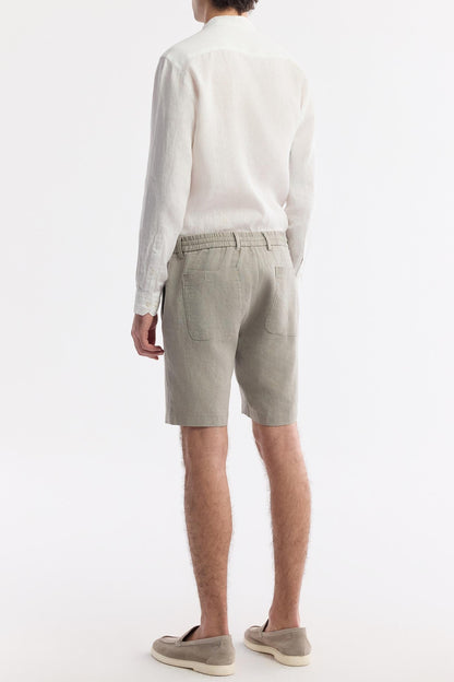 Rear view showing dual pockets and soft elastic band of the shorts