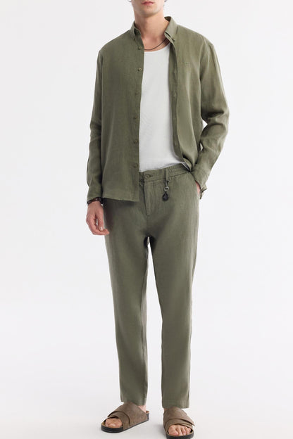 Model wearing complete Olive Green Linen Set (shirt + pants)