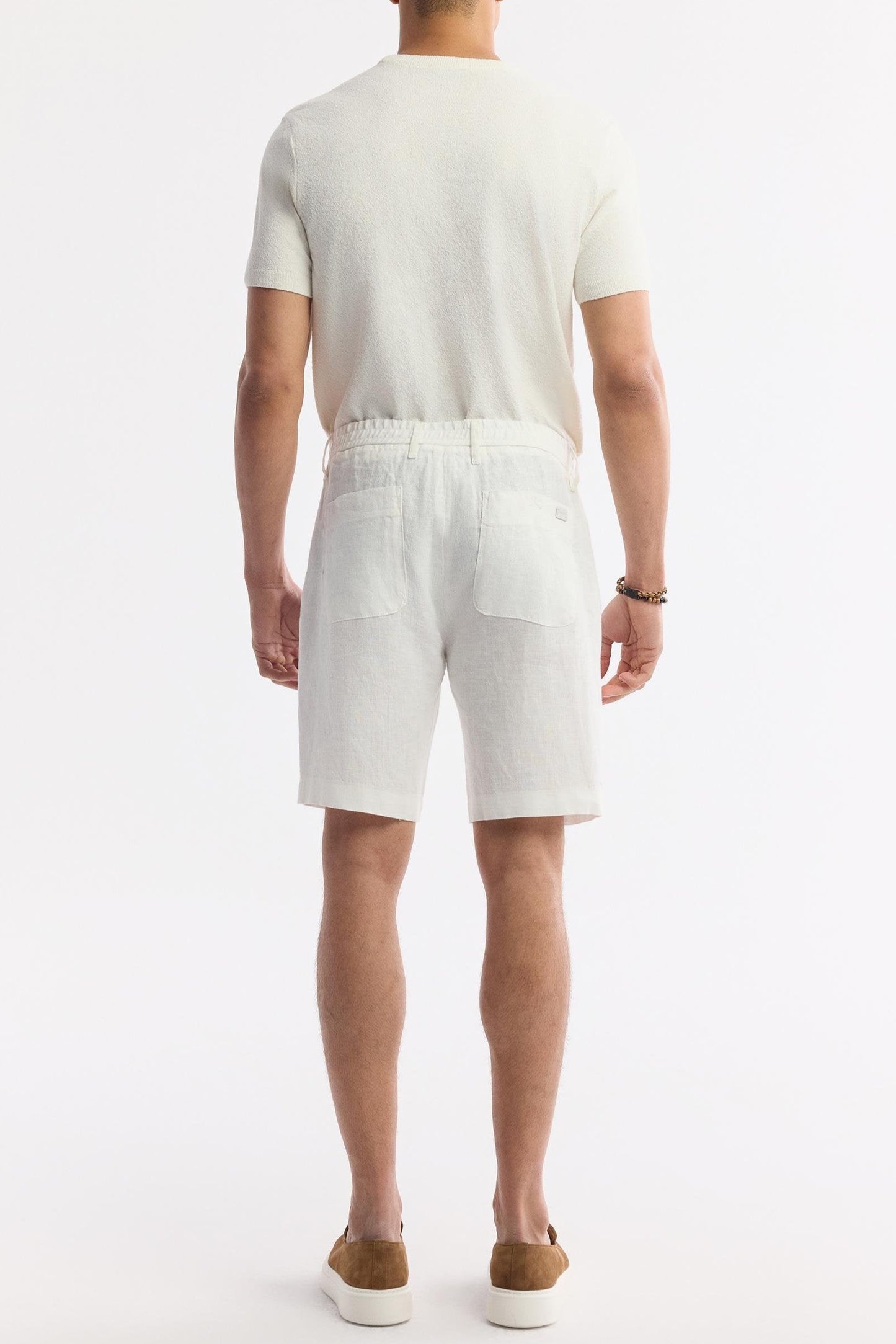 Back view showing elastic waistband and pocket detail