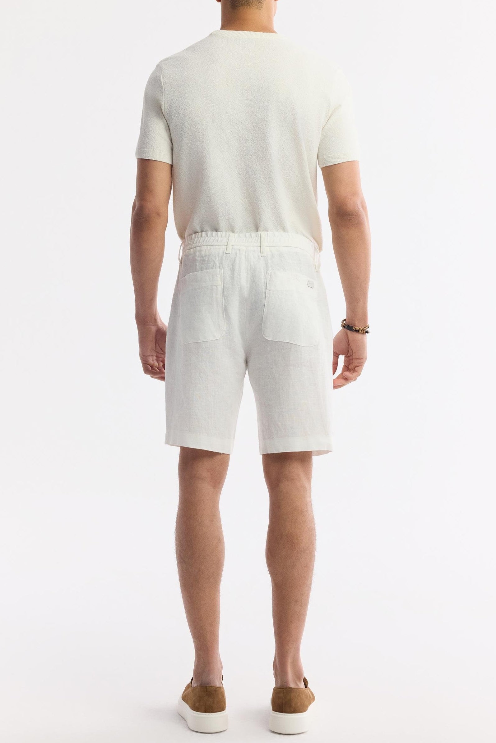 Back view showing elastic waistband and pocket detail