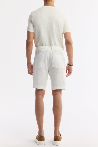 Back view showing elastic waistband and pocket detail