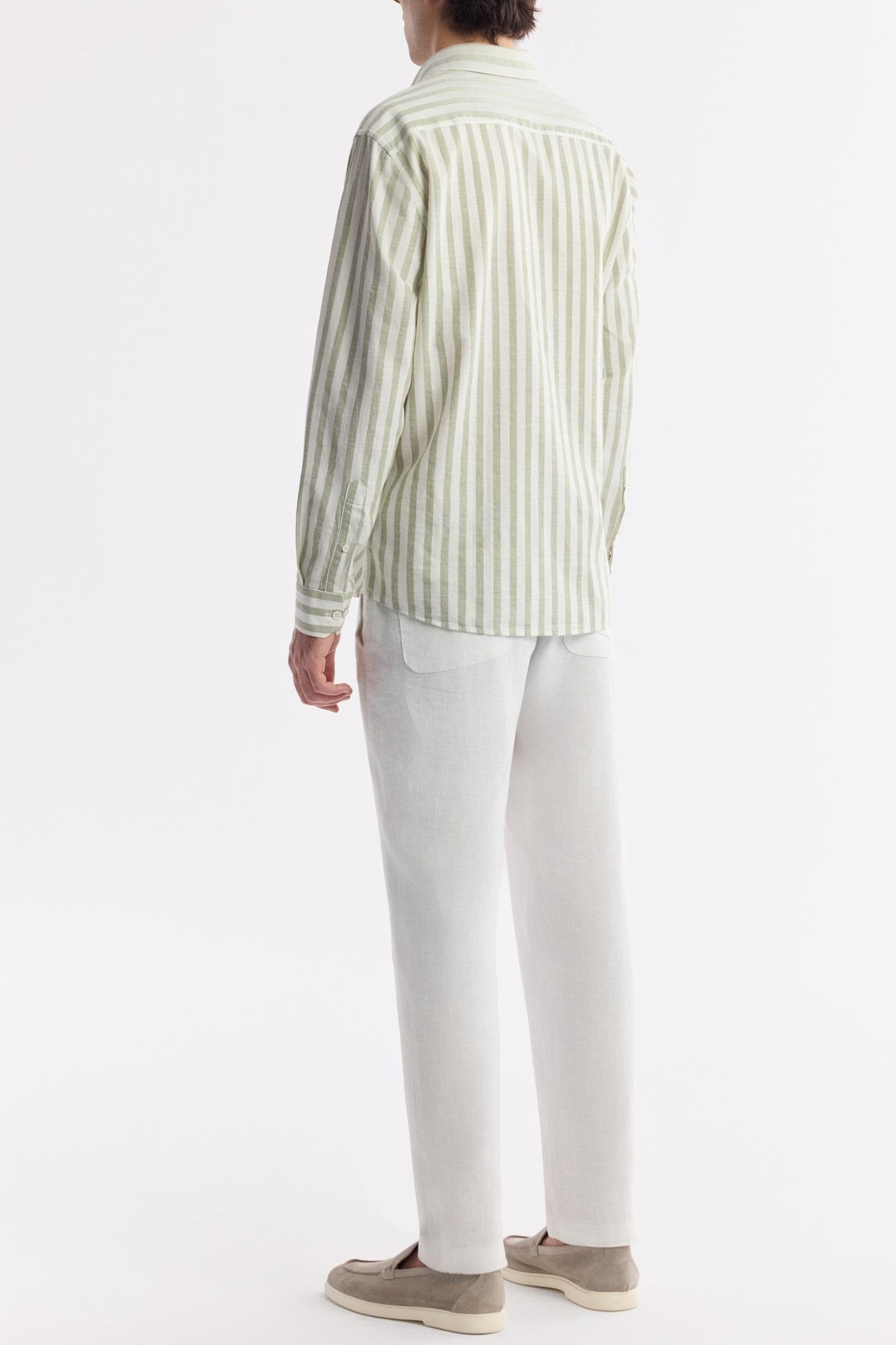 Back view of men's green striped cotton shirt