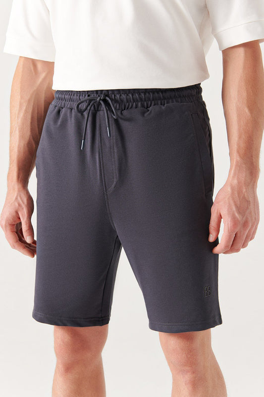 Close-up of drawstring waistband and front pocket on anthracite cotton shorts – Swiftyle