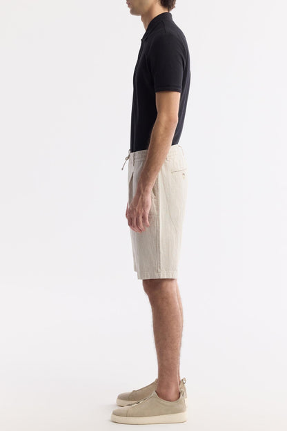 Side view of beige linen relaxed shorts with drawstring – Swiftyle