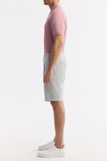 Side view of men’s gray linen shorts with pleats and elastic waist – Swiftyle