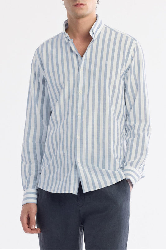 Front view of model wearing sky blue striped 100% cotton shirt with navy linen shorts – Swiftyle