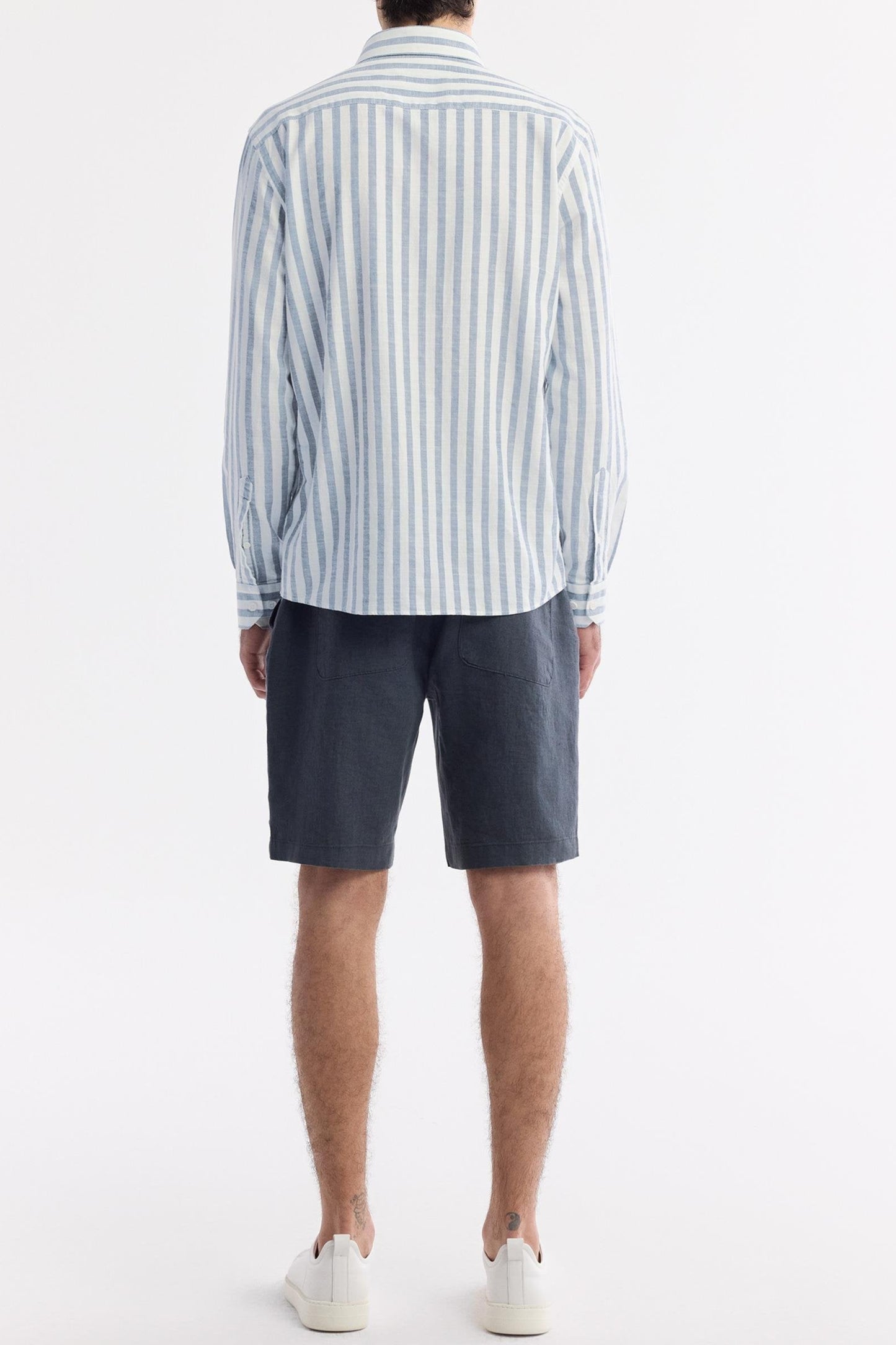 Back view of sky blue striped 100% cotton shirt with vertical lines – Swiftyle