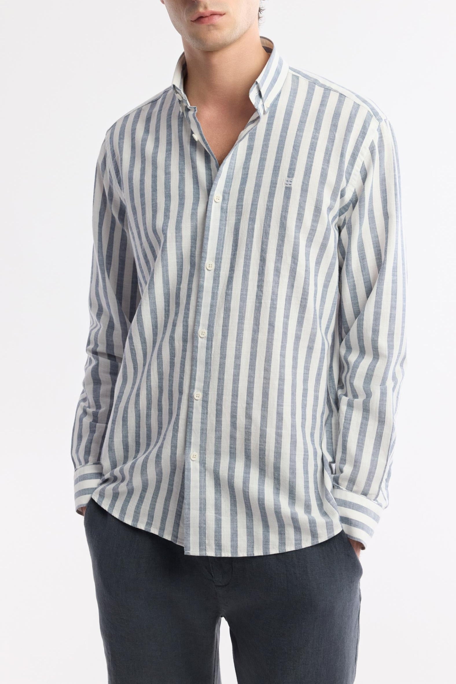 Model wearing Swiftyle navy striped cotton shirt – front view